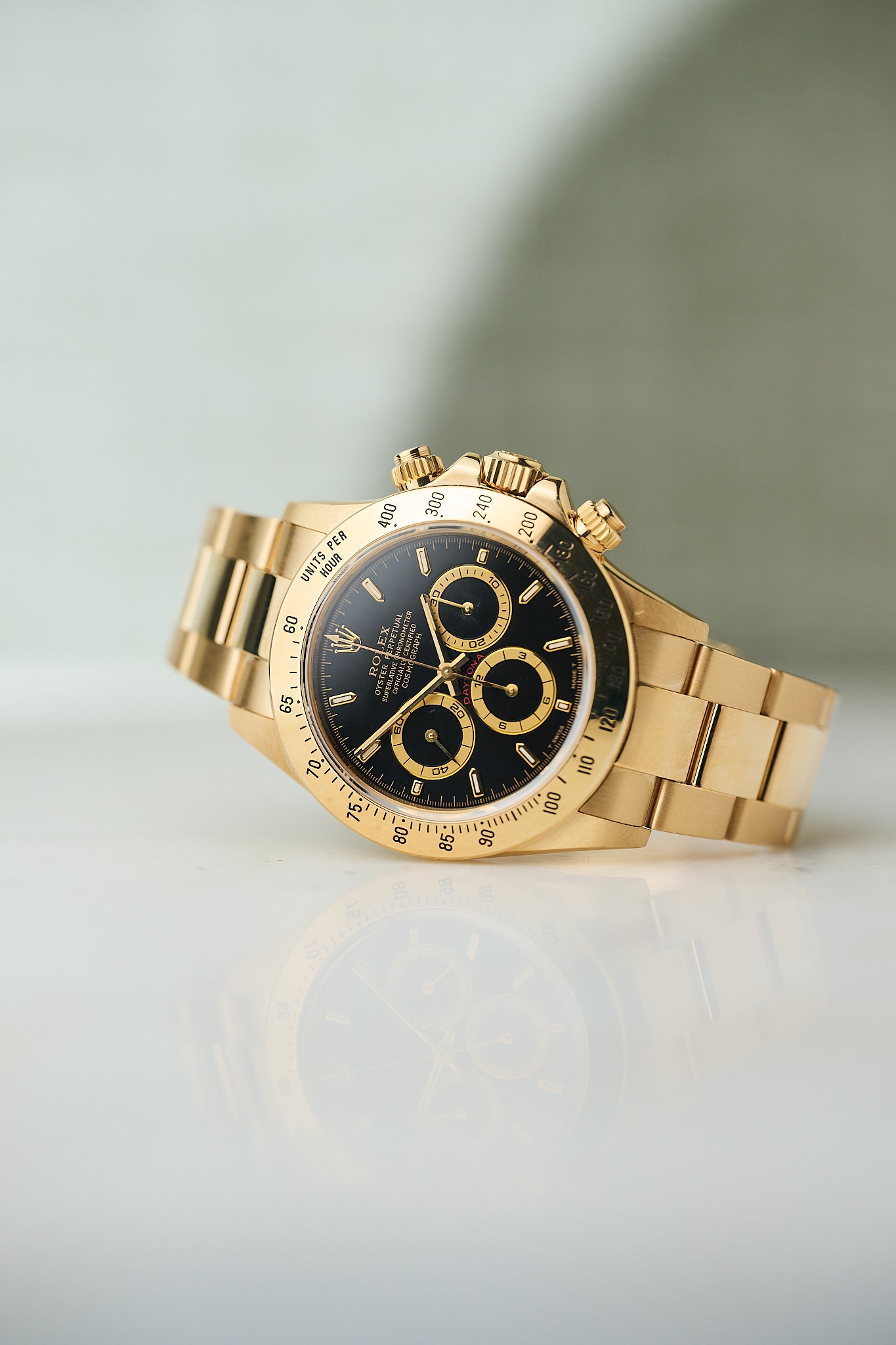 Rolex daytona gold zenith hot sale