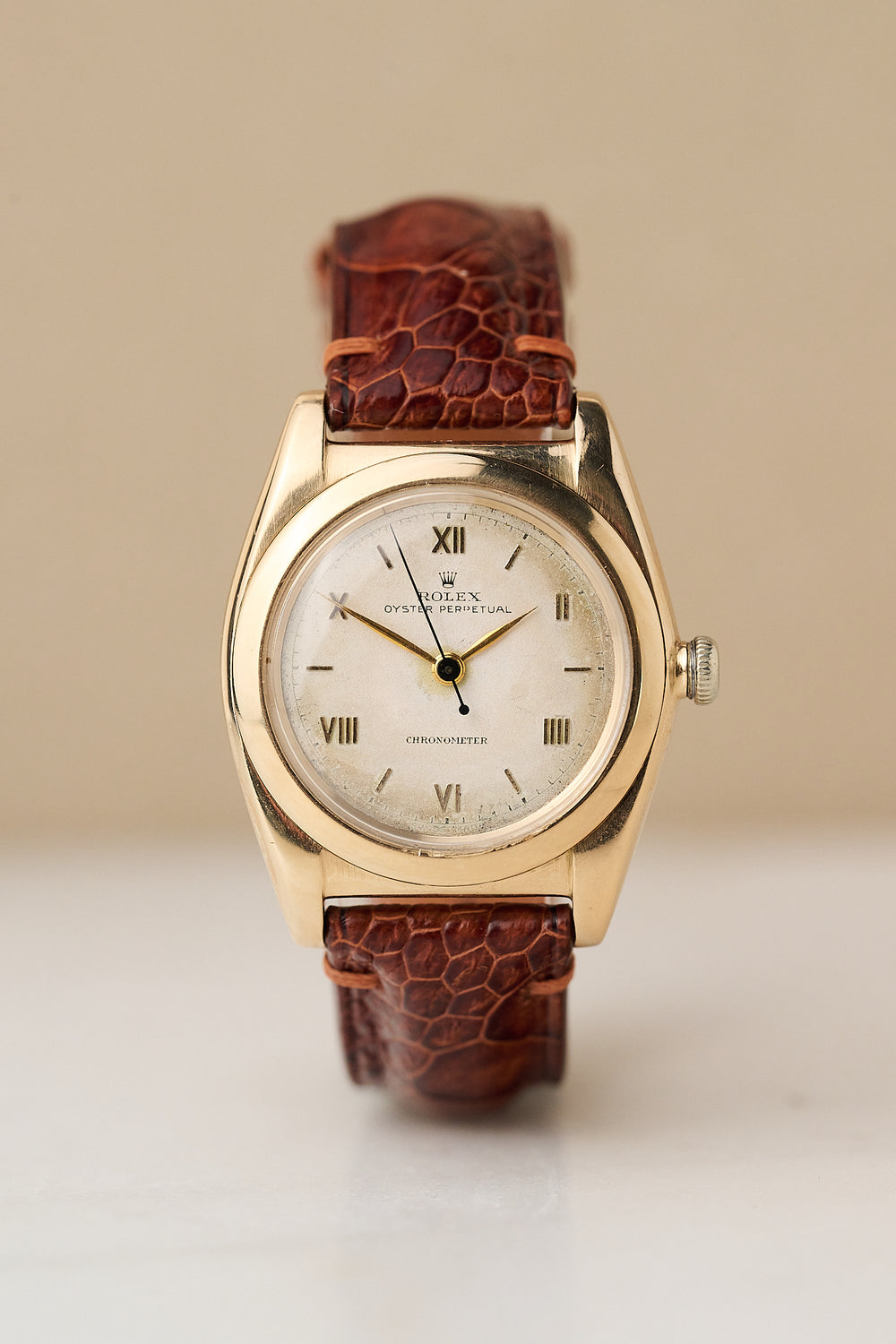 ROLEX OYSTER PERPERTUAL 14K YELLOW GOLD 'BUBBLEBACK'
